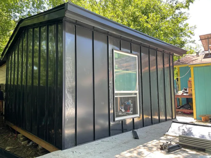 Black standing seam metal wall panels for Metal Roof Installation in McSwain