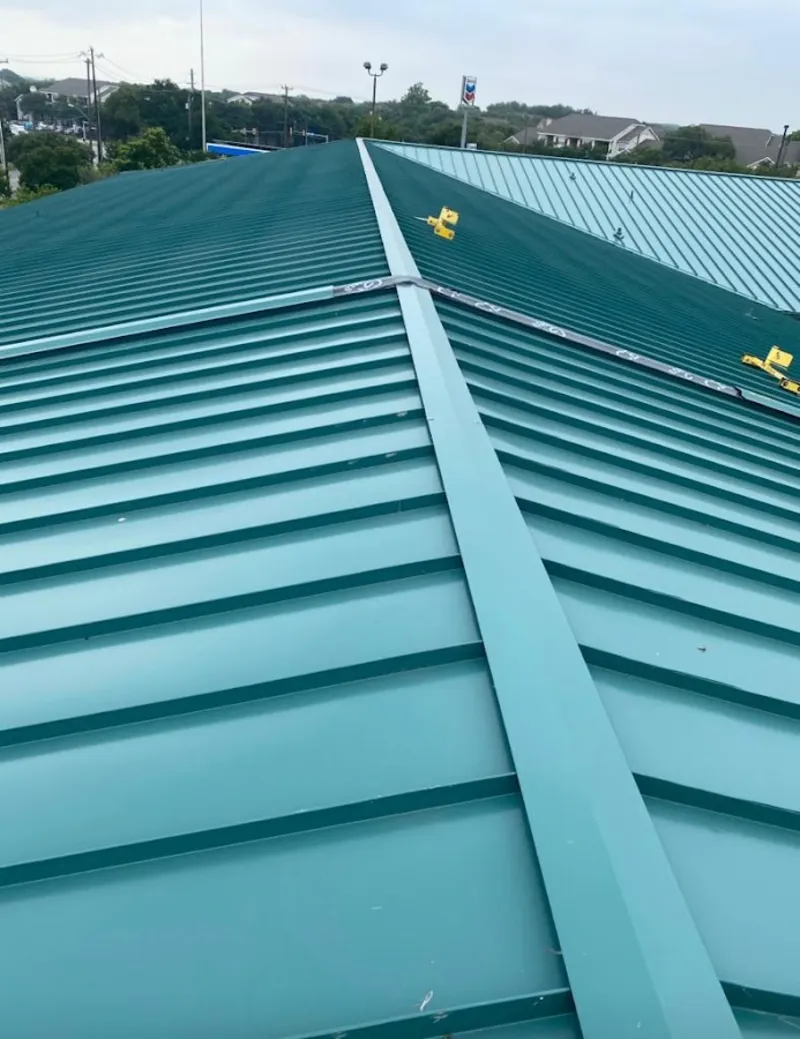 Green commercial metal roof ridge and valley for Metal Roof Repair in McSwain